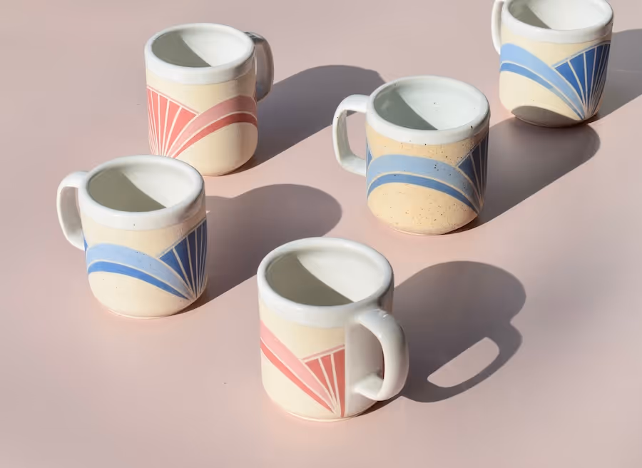Pink and blue mugs in the Sound design by Stendahl Ceramics.