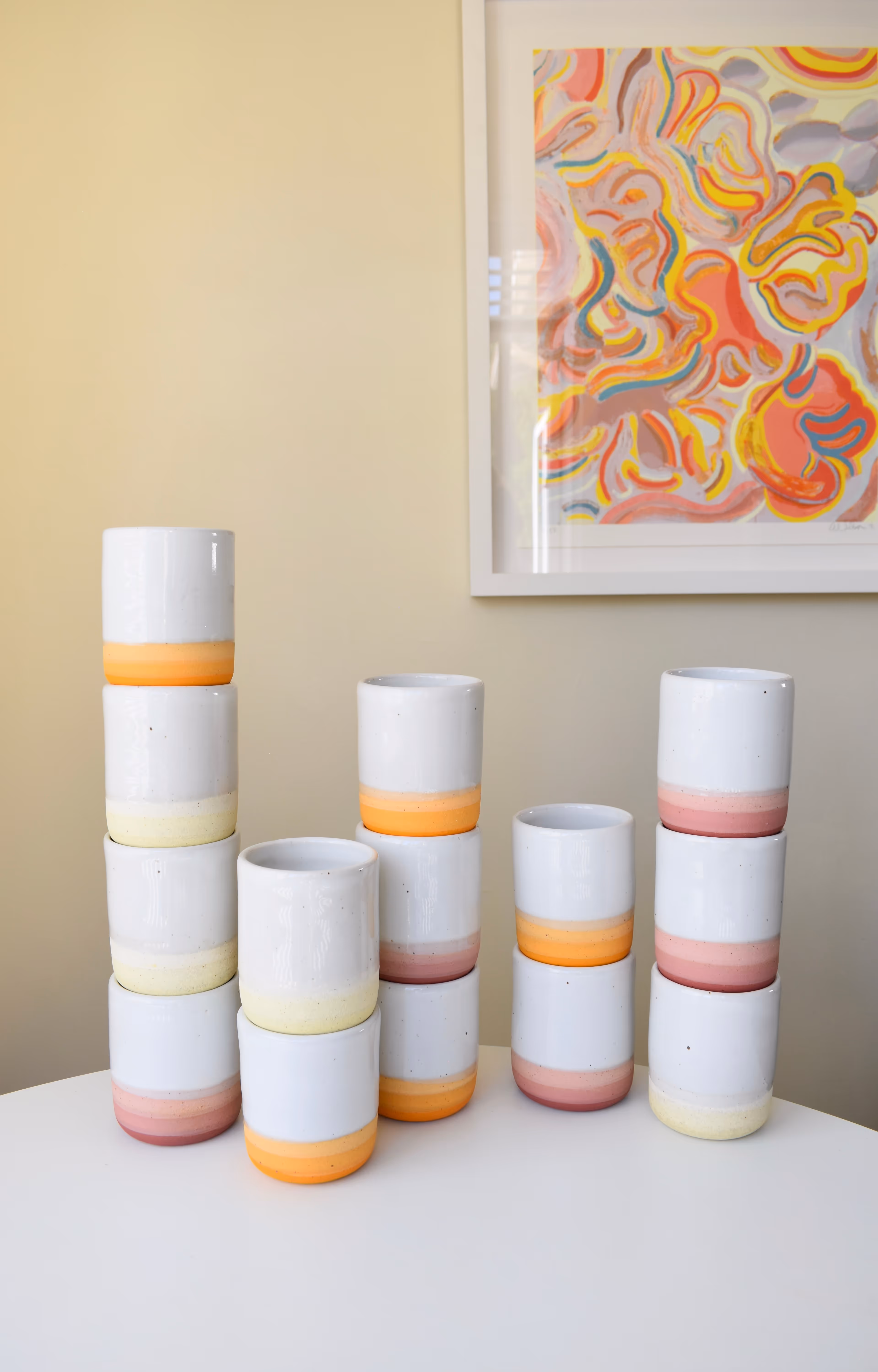 Colorway tumblers stacked on the dining table. 