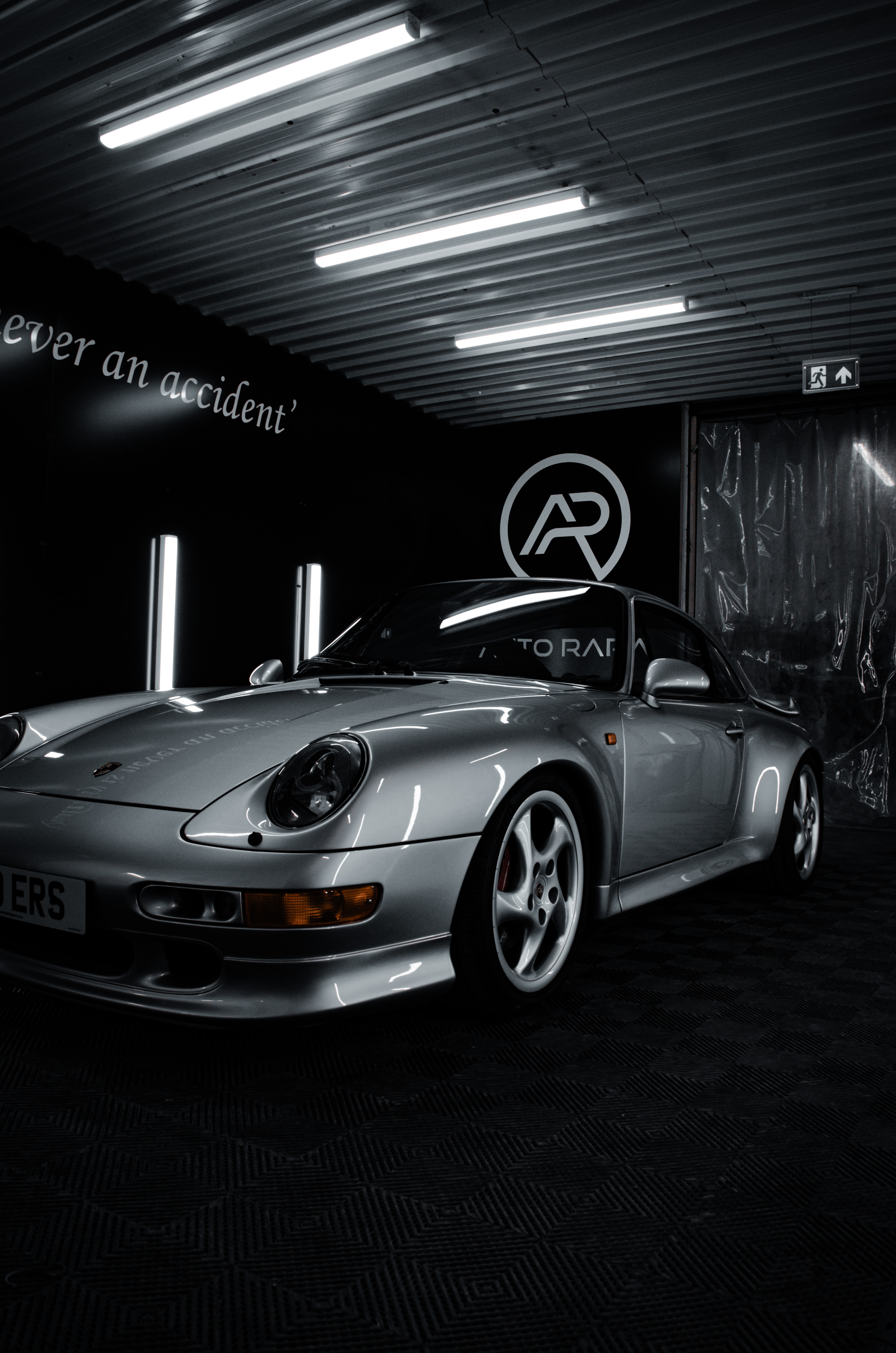 Classic Porsche 911 in the Auto RARA Quality Inspection Bay