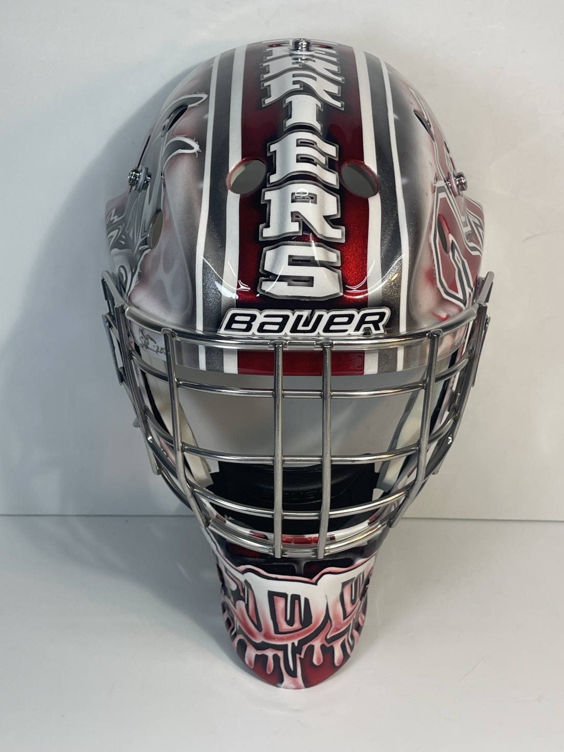 Front view of Teddy's custom goalie helmet