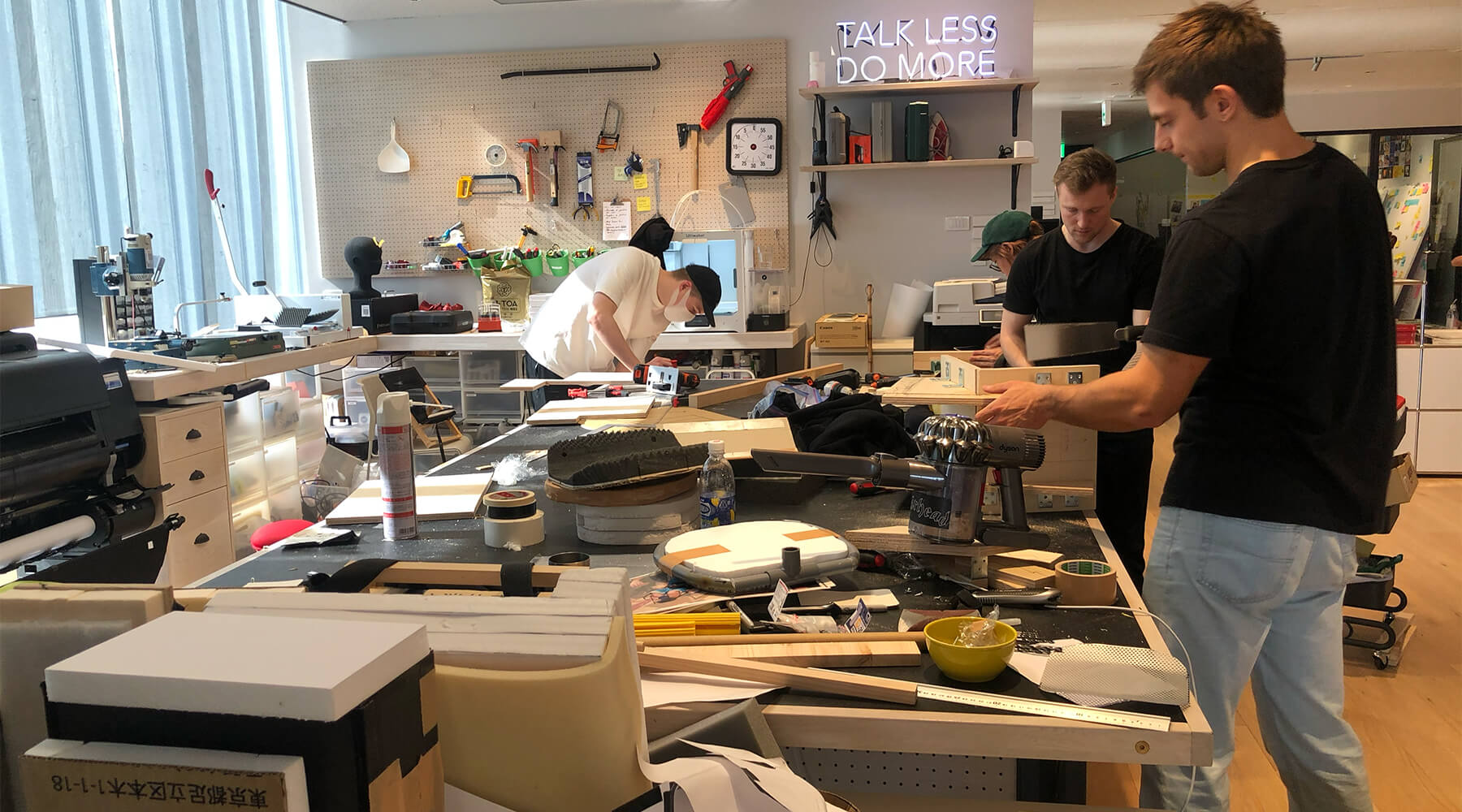 Designers working on a prototype of the IKOU chair