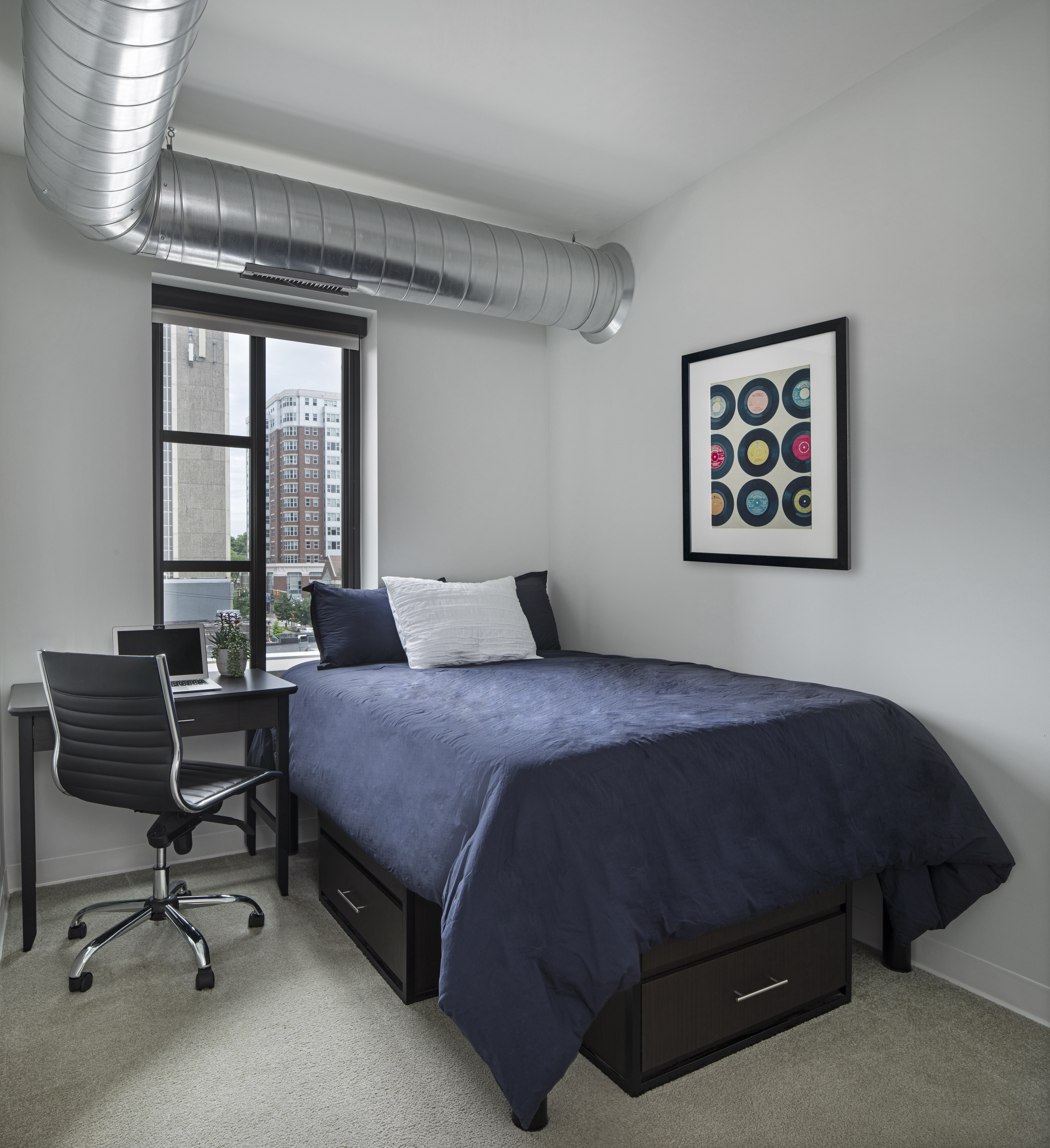 Bedroom with Blue Sheets