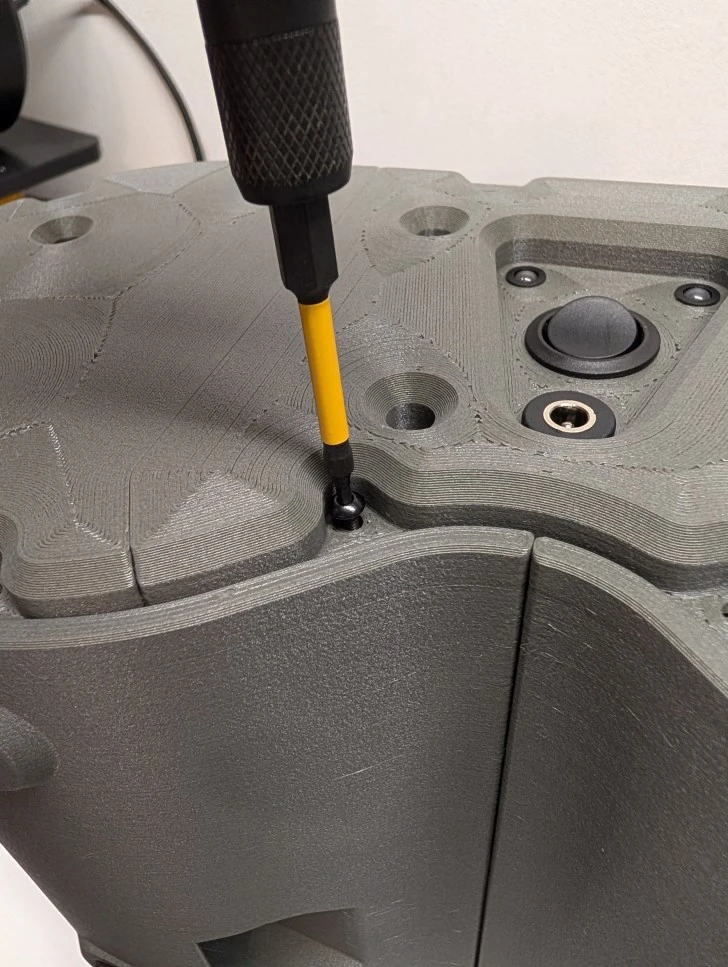 Step 24: Attach the rear baffle image 1