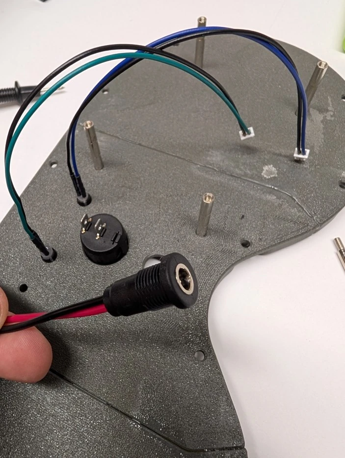 Step 13: Install the charging jack image 1