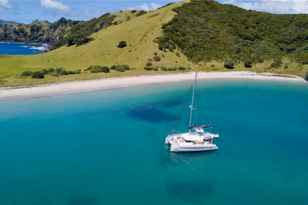 Serenity at anchor at Waewaetorea Island, New Zealand