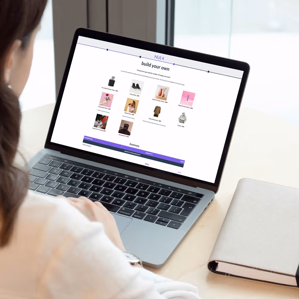 A women looking at a laptop