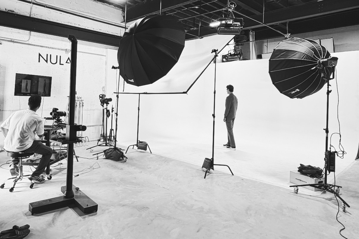 The Studio Nula cyclorama in Brooklyn during a shoot, lights and camera rigged