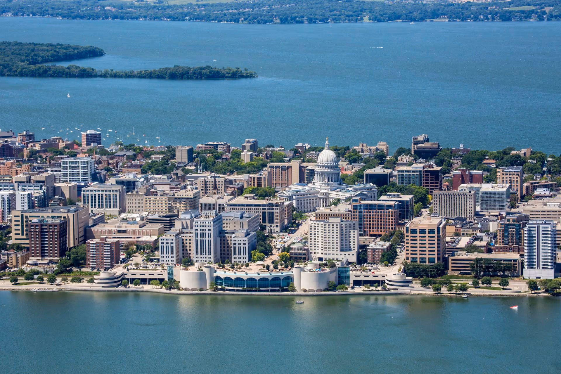 Madison skyline and Wisconsin State Capitol between the lakes