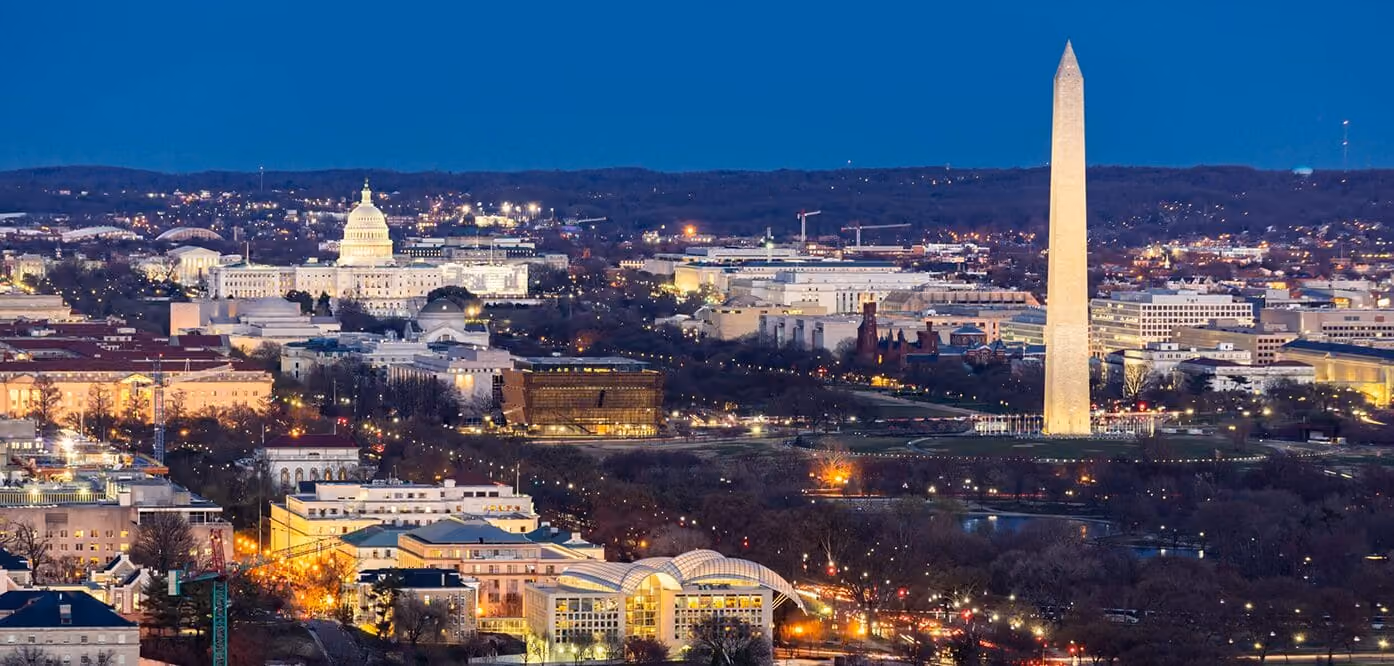 Washington, DC monuments and city skyline at dusk