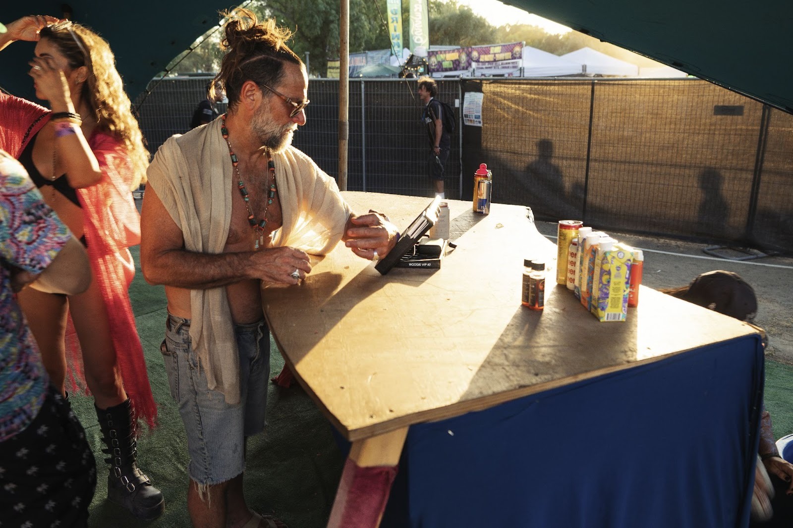 Attendee using RFID wristband on best festival POS terminal for fast contactless payment