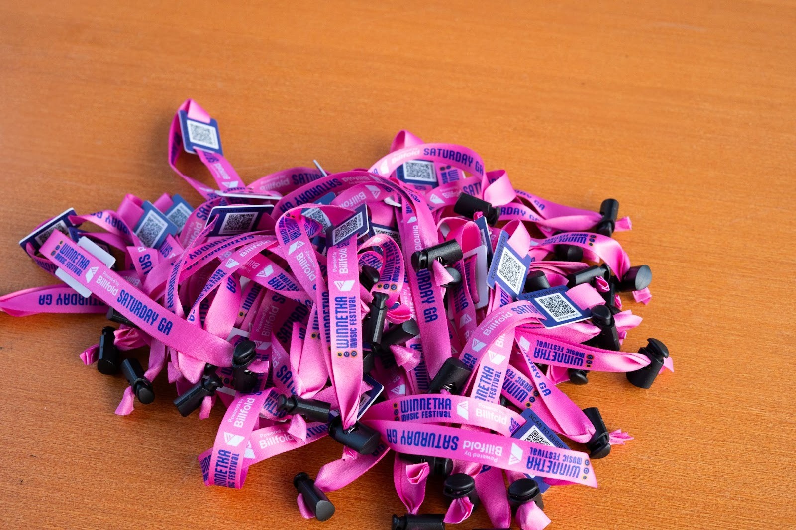 Close-up of RFID transaction wristband on person's wrist in casual setting