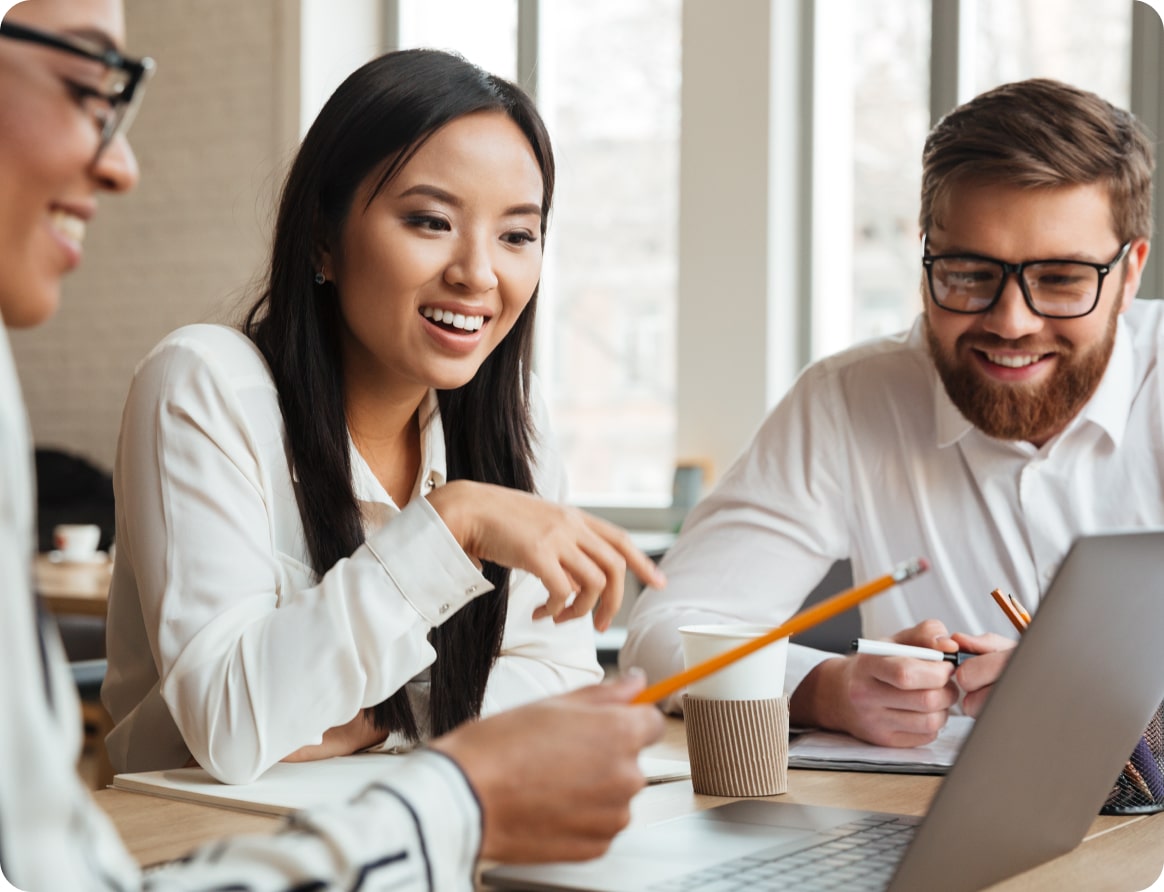 Group looking at laptop