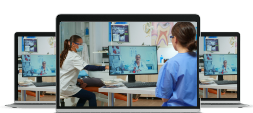 Medical professionals conducting a telepsychiatry session with a doctor on a computer screen in a clinical setting.