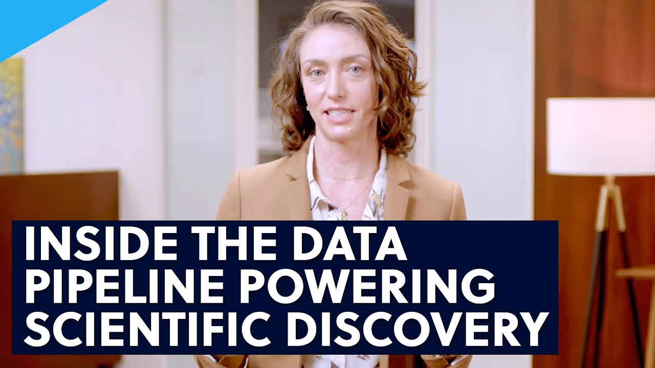 A person with curly hair and a tan blazer speaking, with text overlay reading 'Inside the data pipeline powering scientific discovery'.