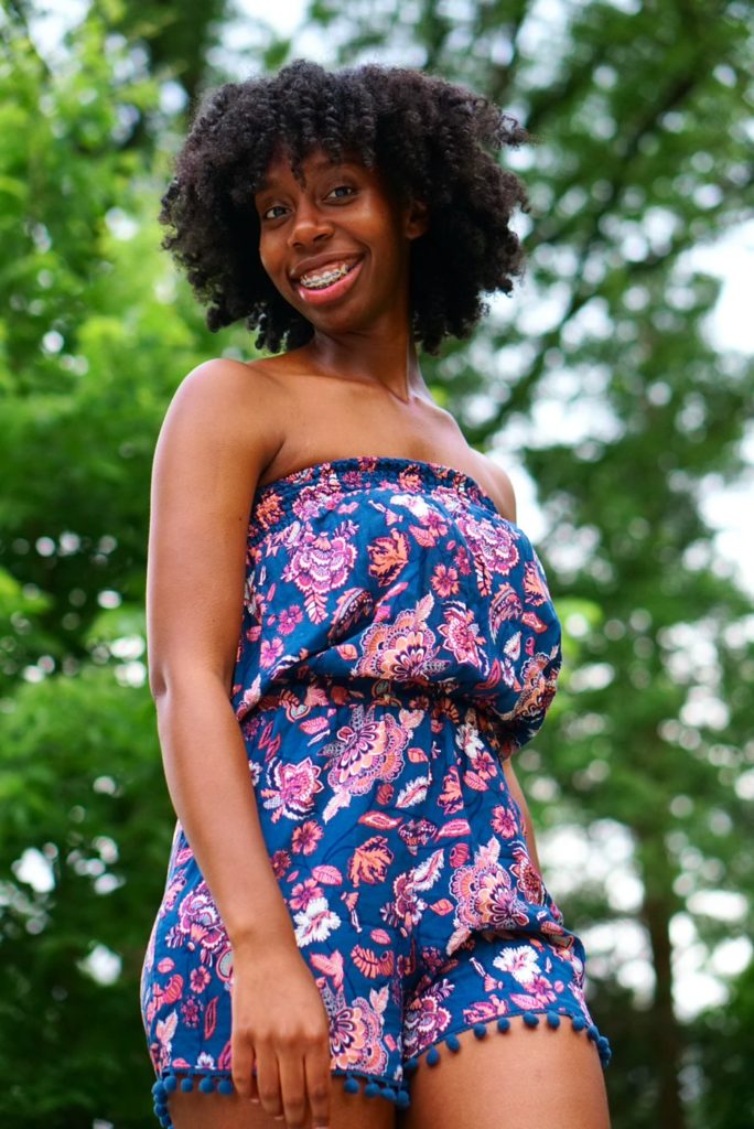 A person with braces smiling.