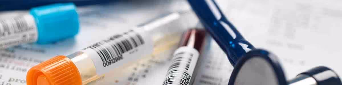 Clinical samples alongside test results and a stethoscope.