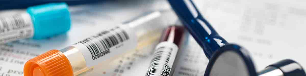 Clinical samples alongside test results and a stethoscope.