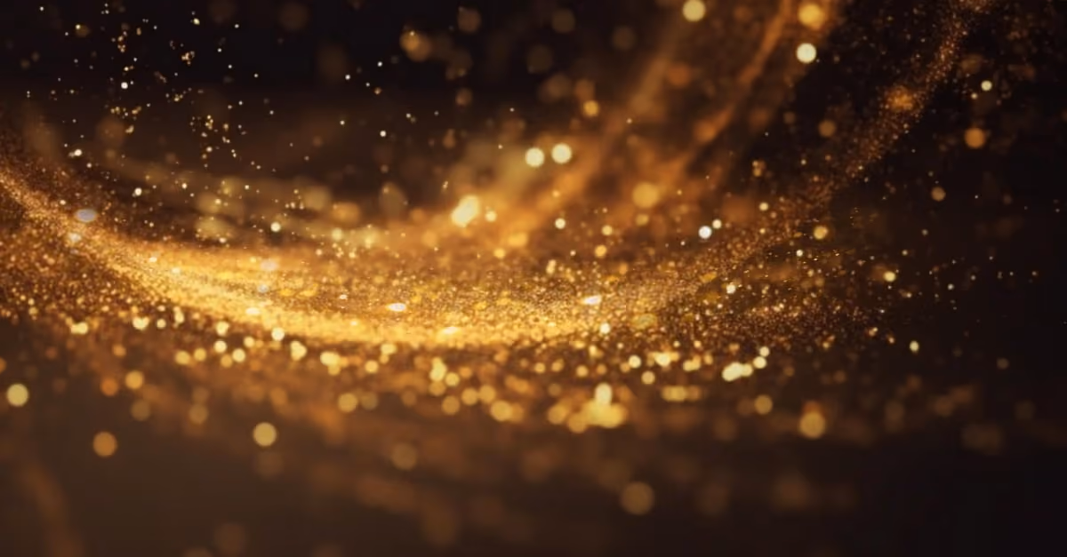 Abstract Background of Blurry Golden Particles