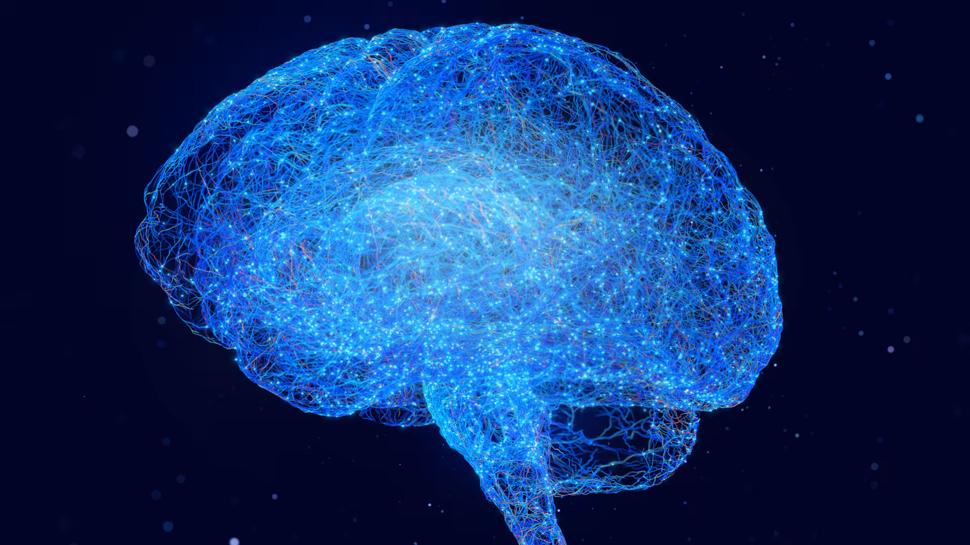 Glowing blue network of neural fibers forming the outline of a human brain against a dark background