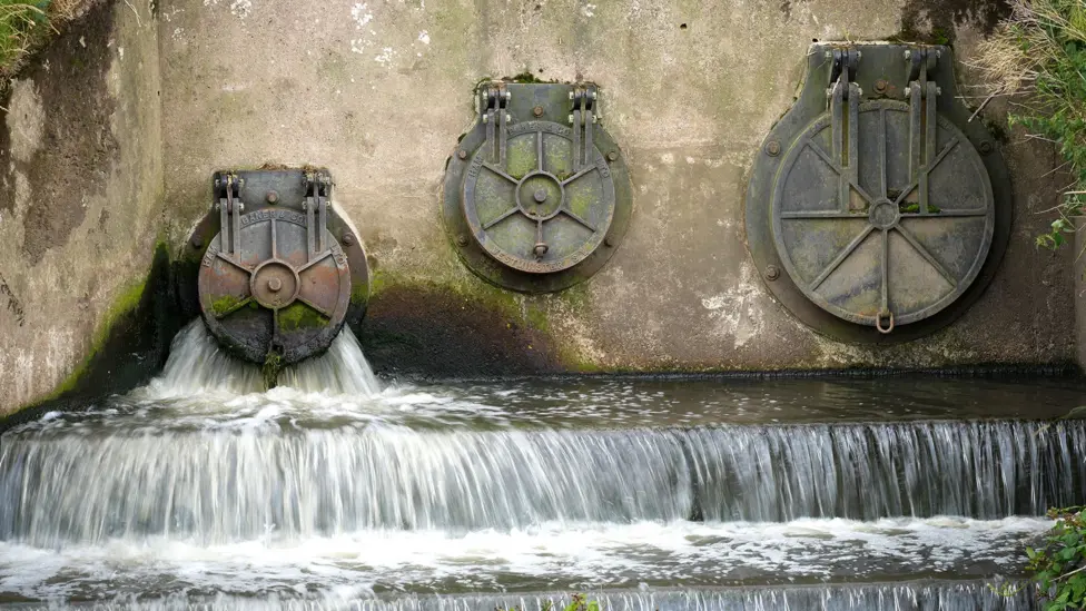 Water discharges from a waste water treatment plant in Stretford UK June 2025