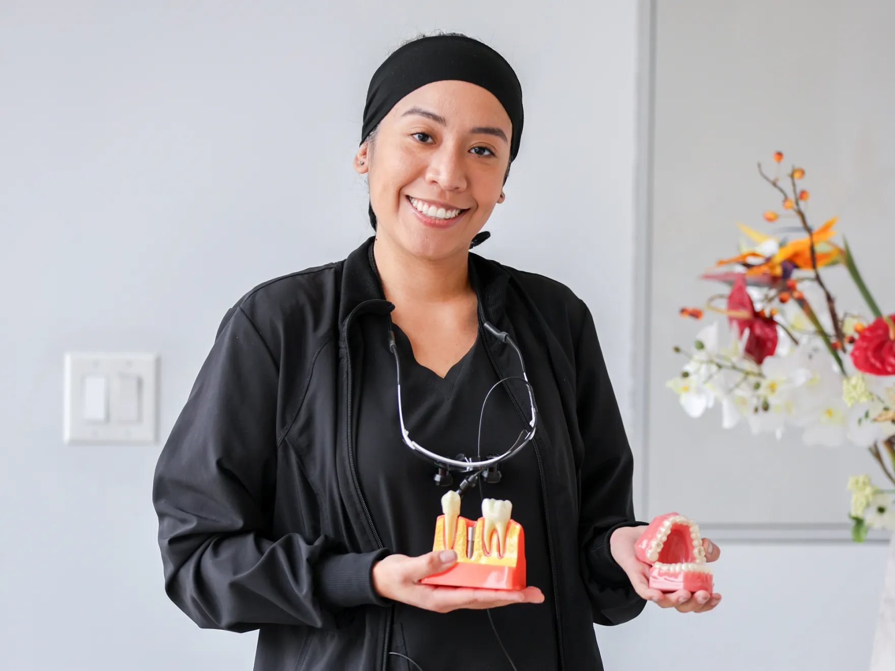 a woman holding a piece of food in her hands