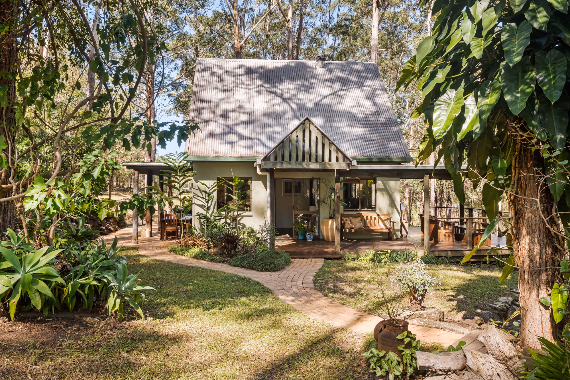 Introducing a captivating tree change retreat nestled on 20 acres of pristine, untouched native Australian bushland.