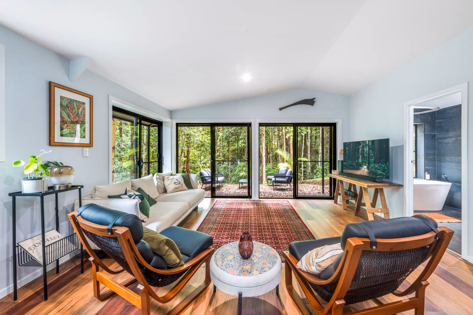 This tranquil property sprawls across just under 2 acres of natural forestry, featuring two distinct residences meticulously designed for privacy, scenic outlooks, and a connection with nature. A captivating property, full of charm and countless possibilities.