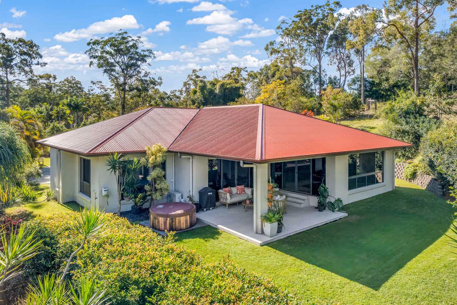 Nestled on a fully fenced, private 1-acre lot, this beautiful home offers the perfect blend of space, comfort, and convenience.
