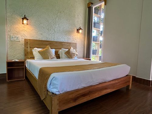 gray sectional couch beside brown wooden table