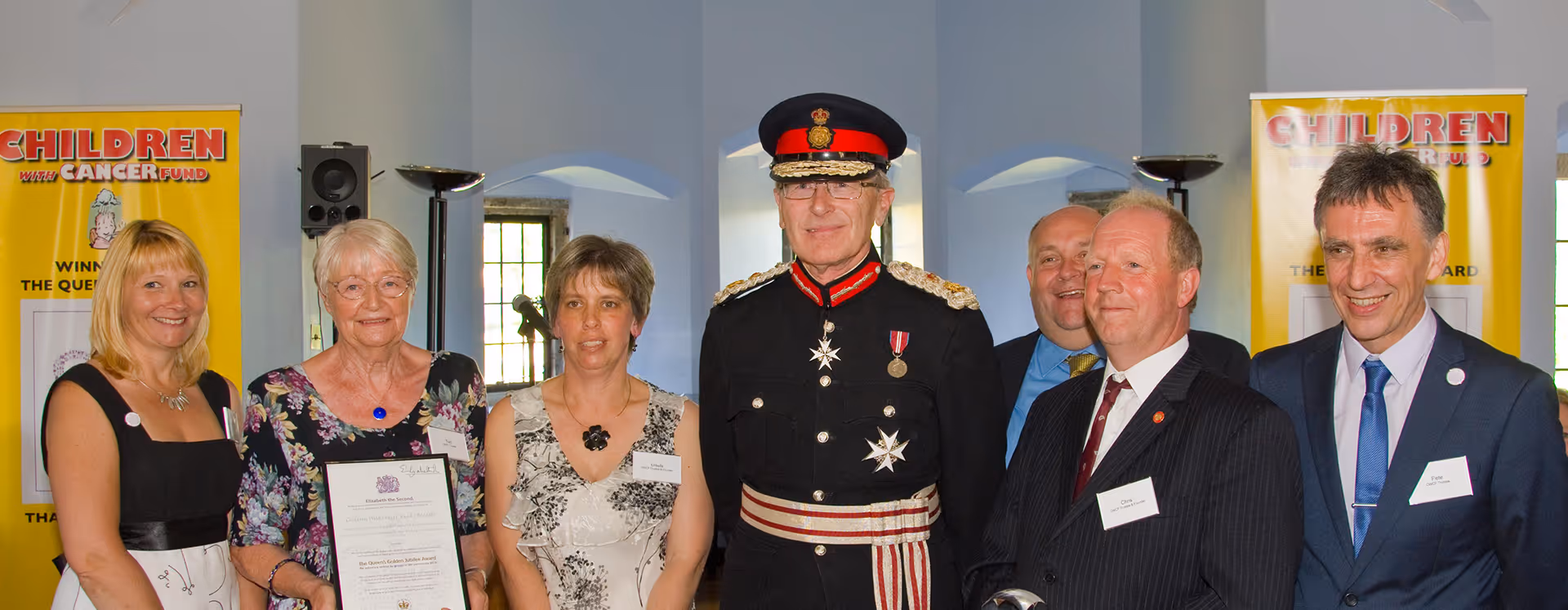 A group of people standing next to each other.