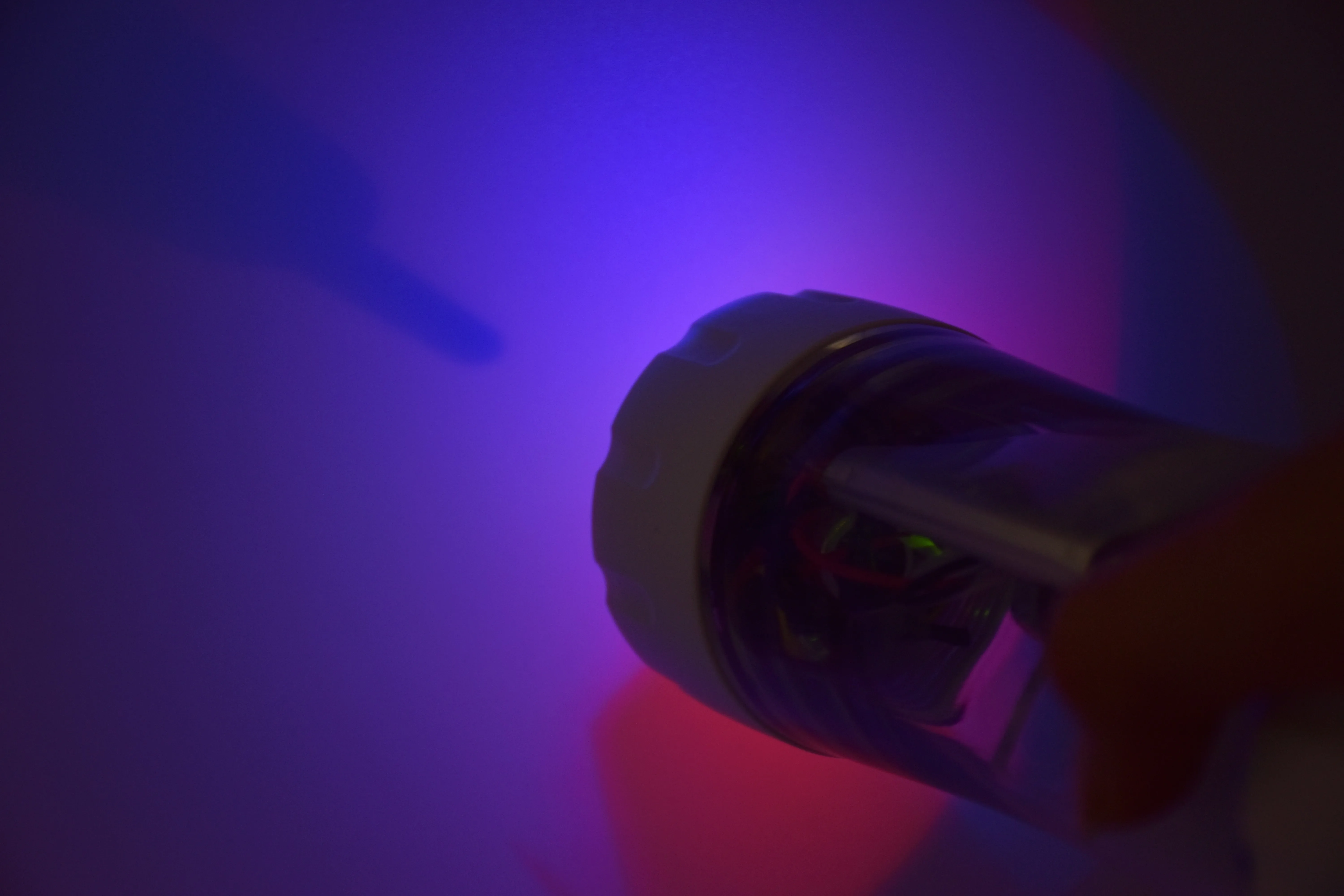 Light blaster projecting red and blue LEDs to create purple light and colored shadows