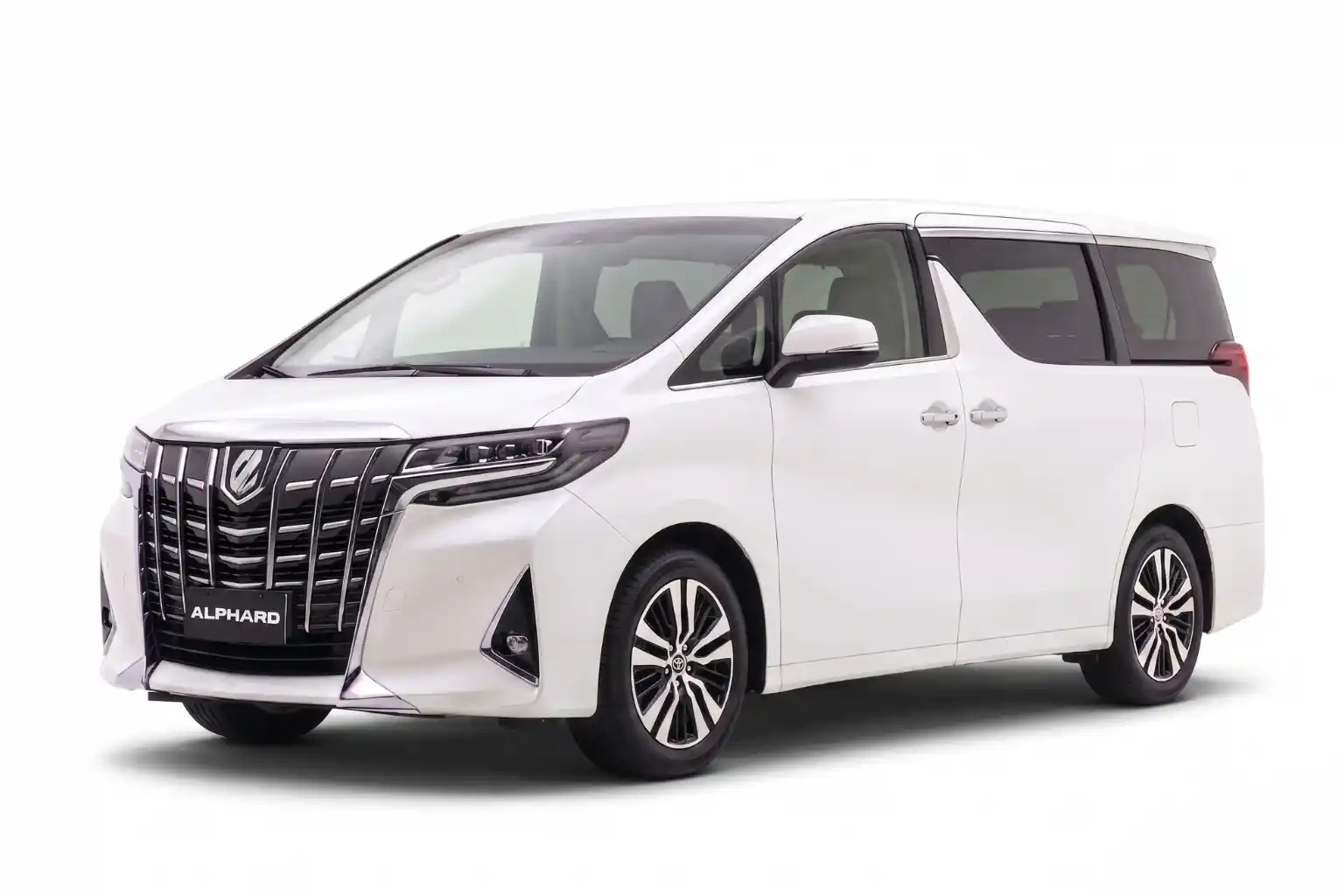 White Toyota Alphard luxury minivan with distinctive large front grille and modern headlights.