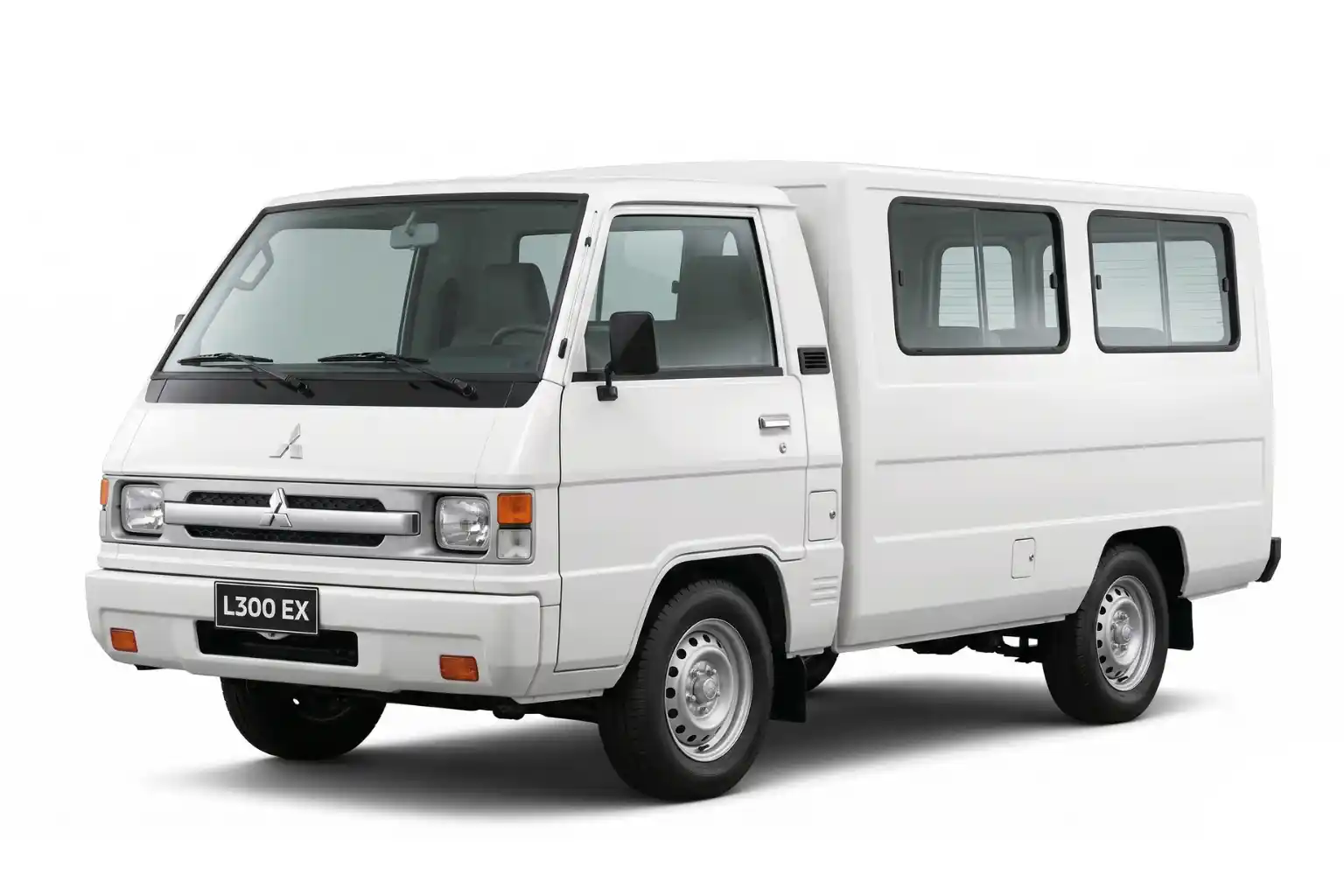 White Mitsubishi L300 EX van with rectangular headlights and side windows, shown from front side angle.
