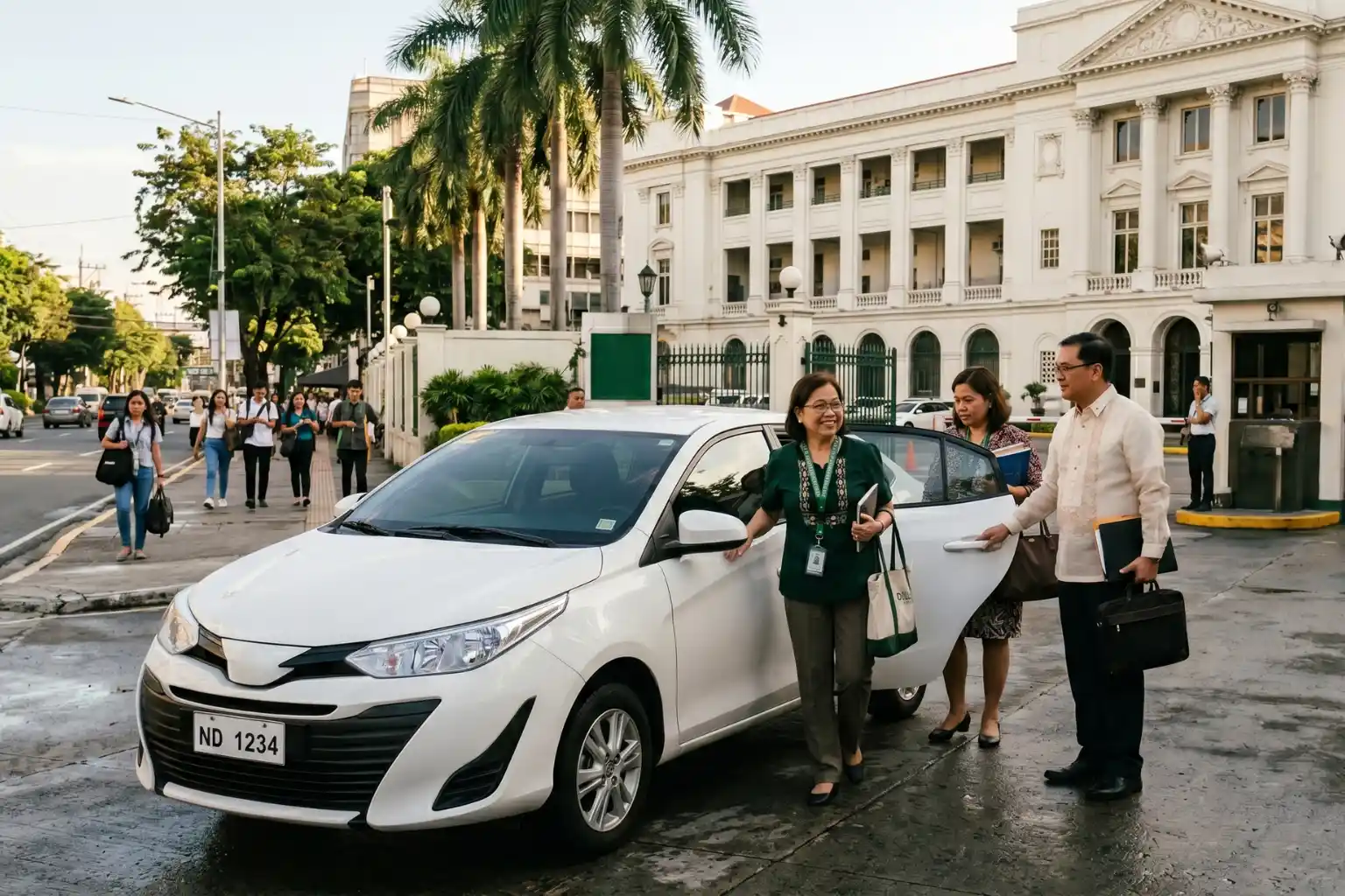 Three professionals near a white car outside a grand white building with columns and palm trees.