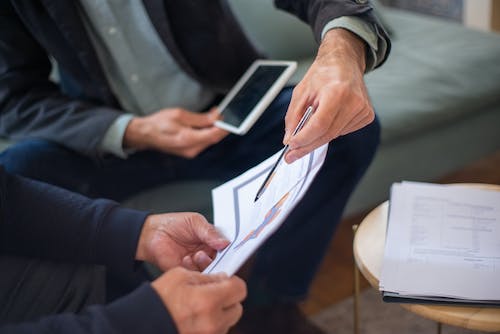 Free  A Person Holding a Document  Stock Photo