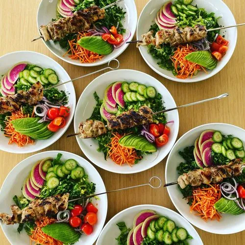 A few vegetable bowls on top of a table