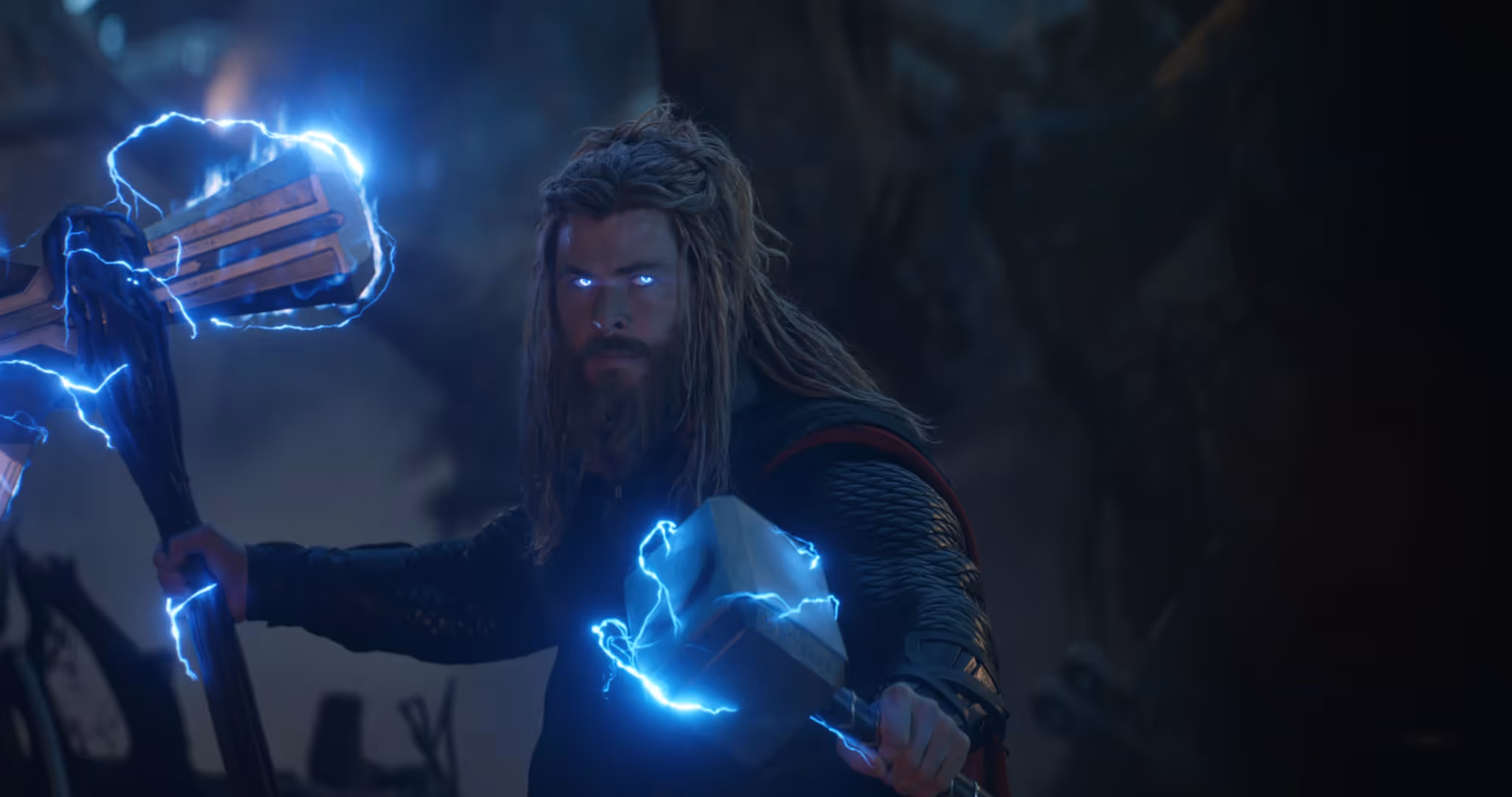 Chris Hemsworth playing Thor with blue electric lights
