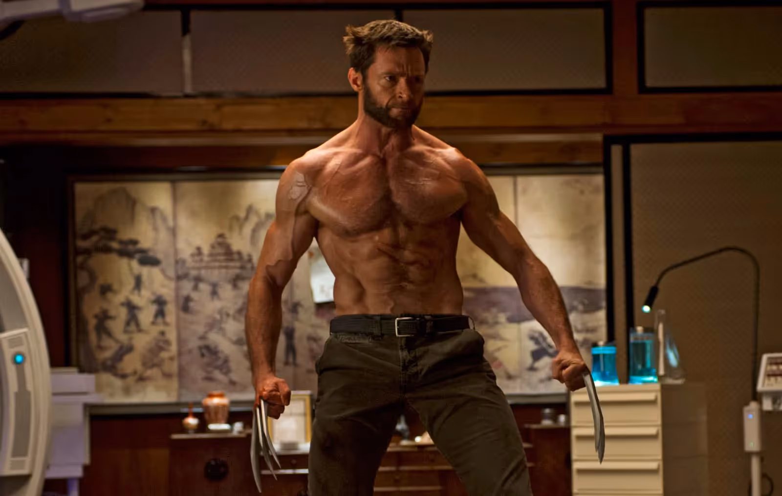 Wolverine half naked, mad, claws out