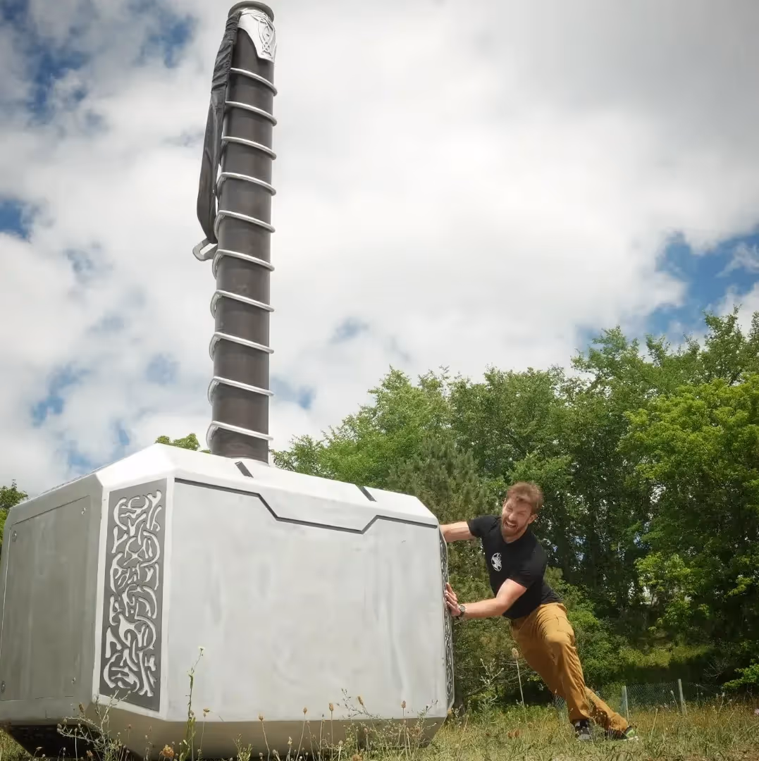 James trying to push the Giant Thor's hammer