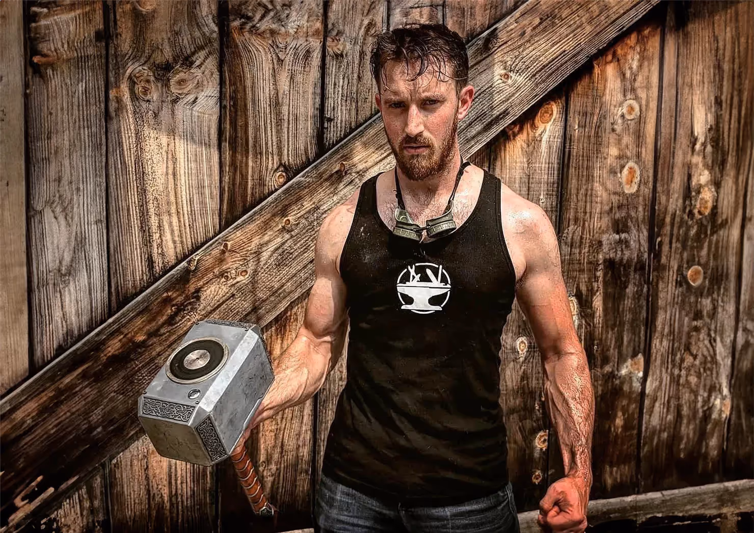 James rough super hero with Thor's hammer