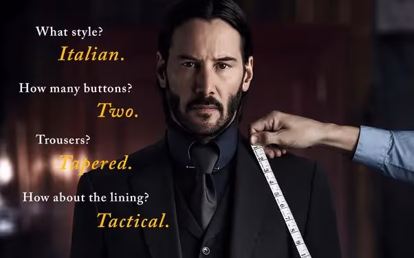 John Wick being taken measures for the suit