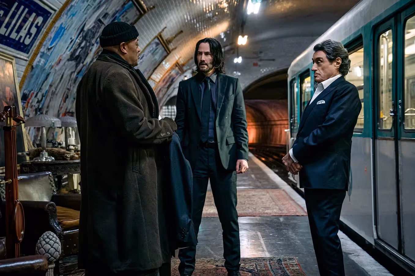 John Wick in a dangerous situation with two other man