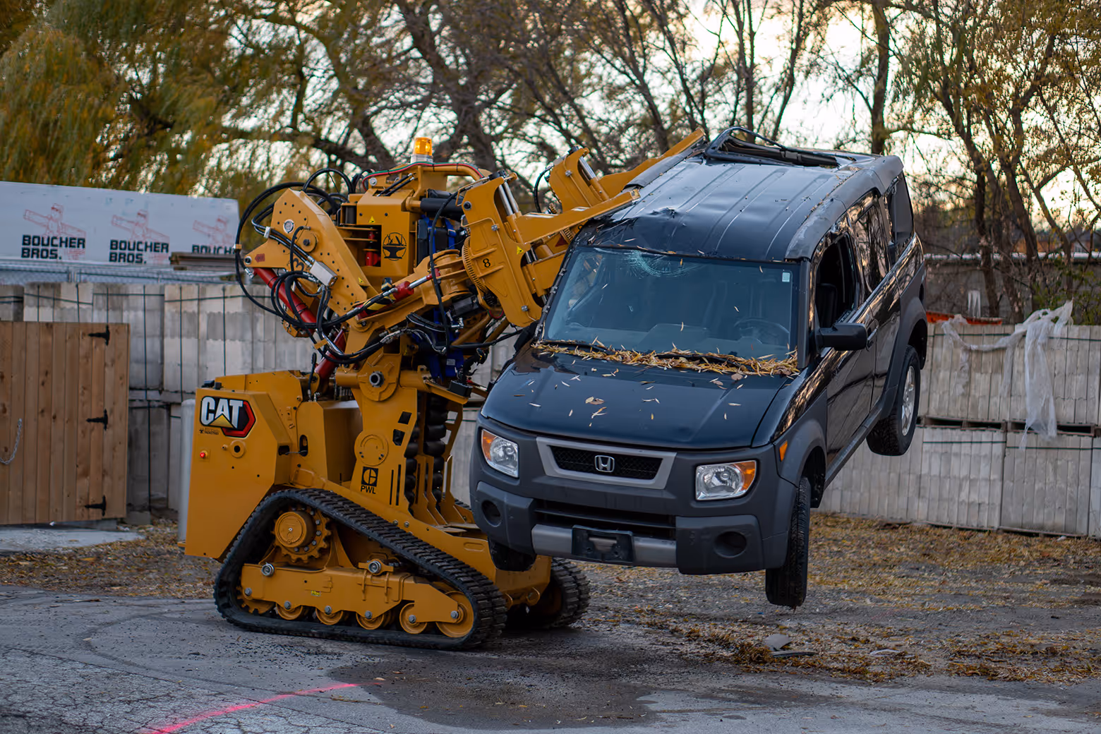 Powerloader lifting a car