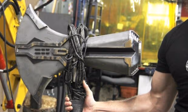 A power loader in Hacksmith's facility