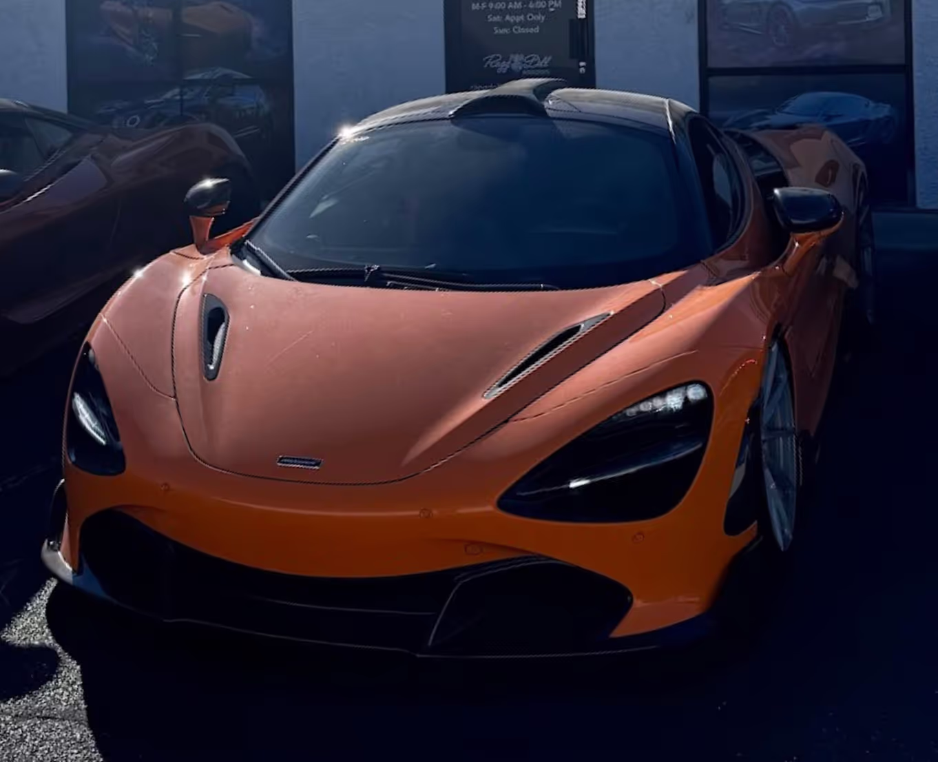 McLaren parked in front of Executive Auto Service