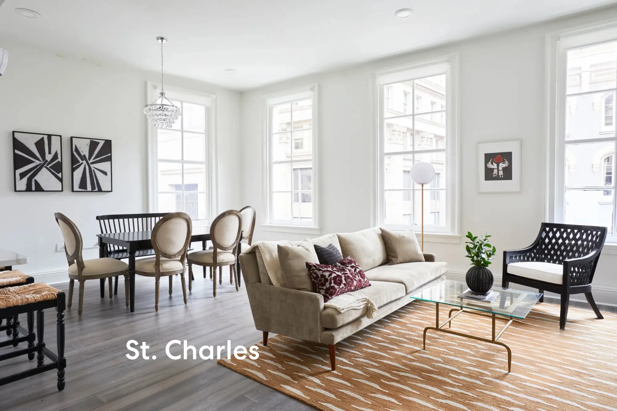 bright living and dining room at a st charles apartment in new orleans