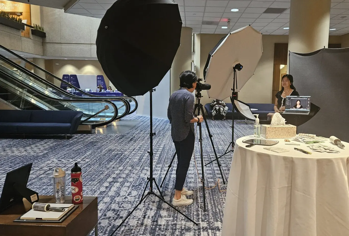 Image showing setup of volume headshots at a conference in a hotel lobby