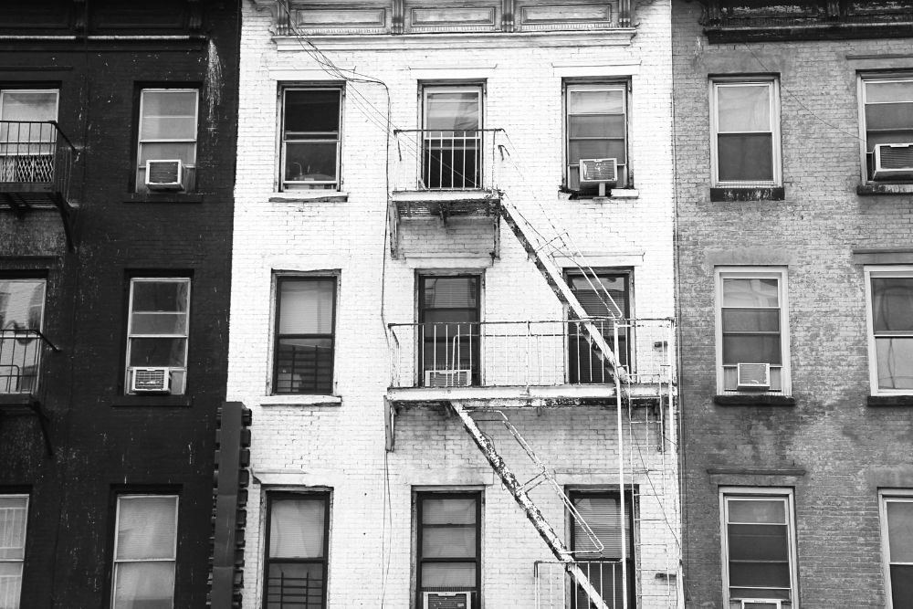Black and white image of rent-regulated buildings in NYC