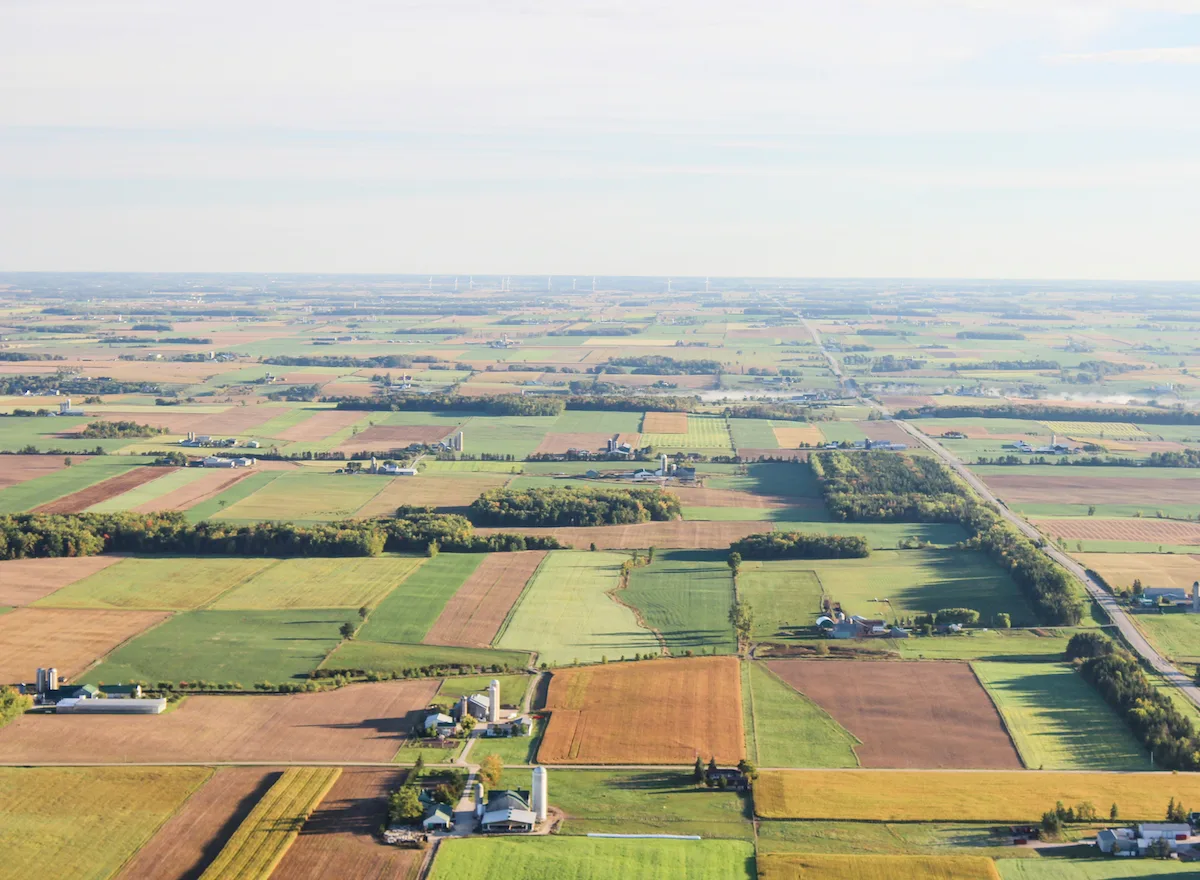 Aerial view of farm fields and barns