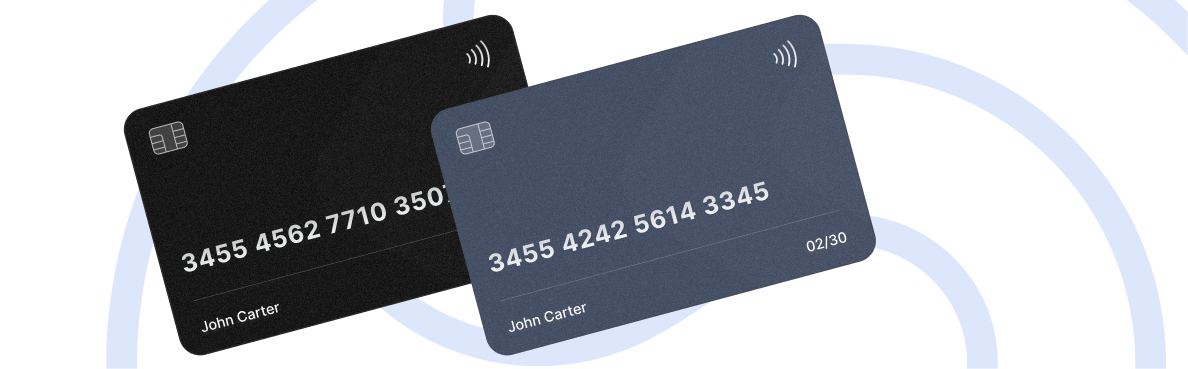 Image illustrating two overlapping payment cards, a black one and a blue-grey one, both featuring a chip, contactless symbol, and details for user, set against a background of abstract light blue curved lines.